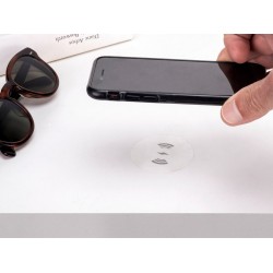 Invisible charger for cell phones and tablets