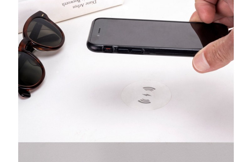 Invisible charger for cell phones and tablets