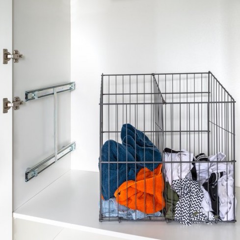 Built-in laundry basket pull-out with compartment divider